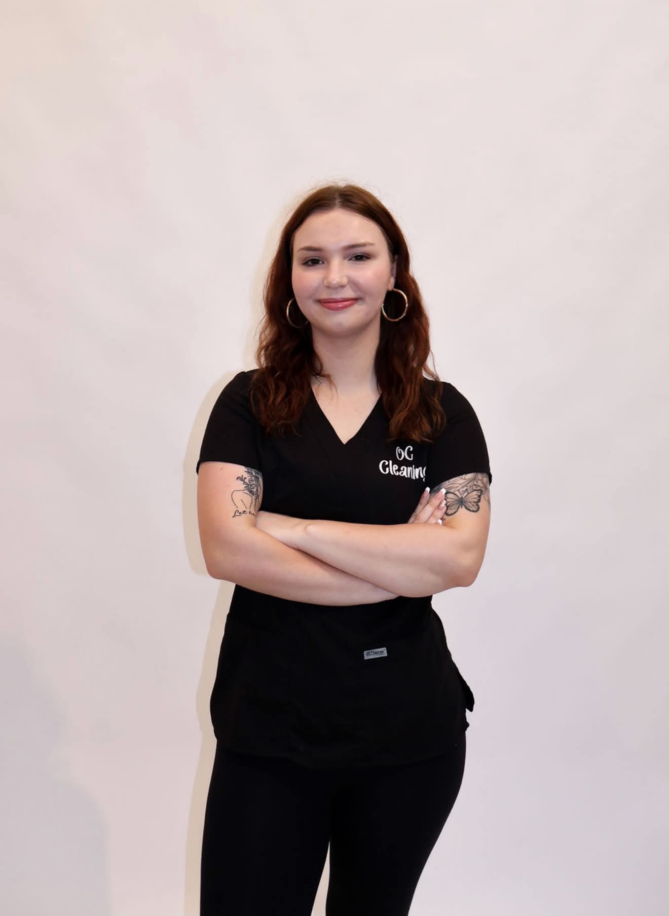 OC Cleaning team member with auburn hair